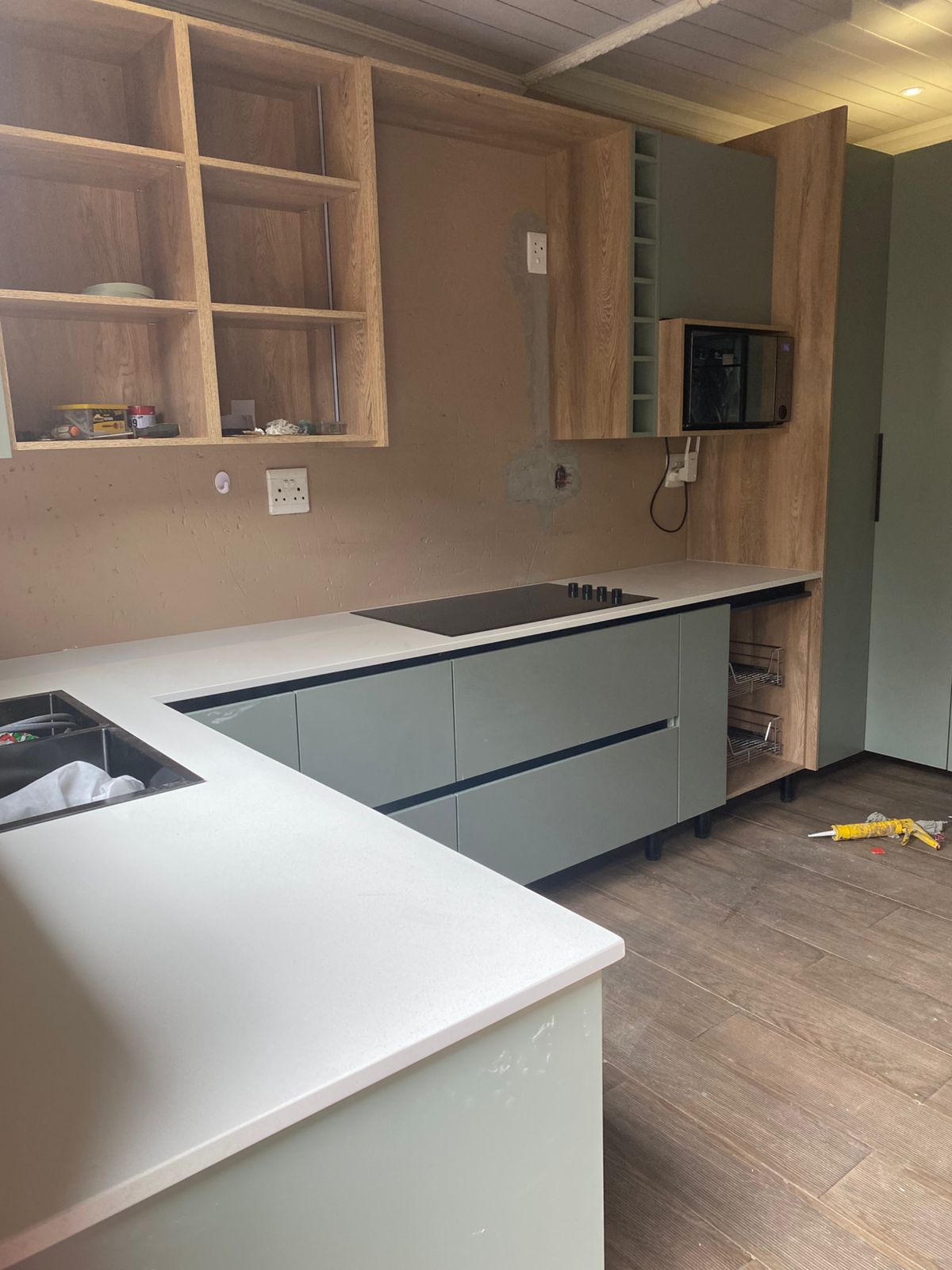 Sage cabinetry & quartz tops